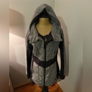 Women’s gray and black, north face, size LARGE long, fitted, winter coat.